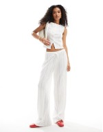 button through broderie tank, halter top and trouser co ord in ivory