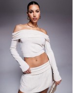fine knit fold over  top and low waist fold over mini skirt co-ord in beige