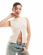 Premium textured button through tank