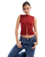 Premium textured button through tank