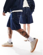 unisex long length denim jorts with contrast stitching in rinse wash blue